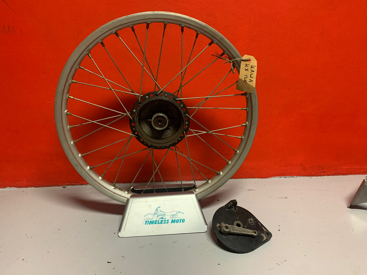 Kawasaki KX125 1980 front wheel. Incl. Anchor plate, Almost new